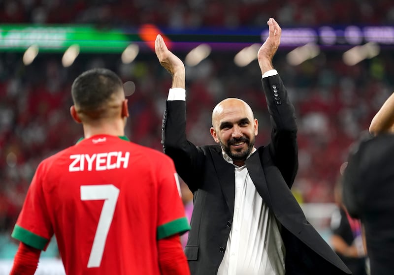 Morocco manager Walid Regragui celebrates his team's victory over Spain in the last-16 of the Qatar World Cup on December 6, 2022. PA