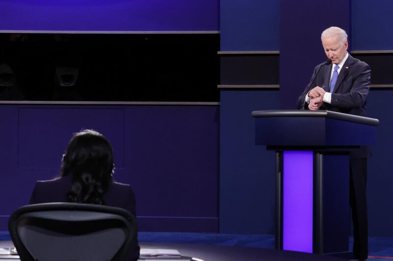 Democratic presidential candidate Joe Biden checks his watch during the presidential debate. Bloomberg