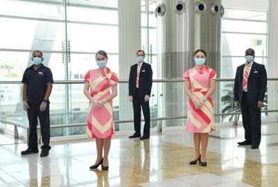 Travellers flying in or out of Duba who book Marhaba's meet and greet service will be accompanied by an agent wearing gloves and masks. Courtesy Marhaba