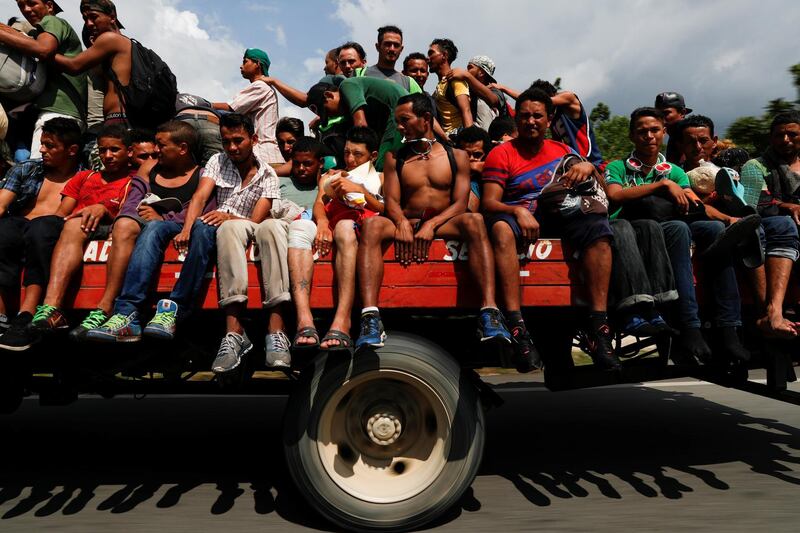 Migrants en route to the United States travel in a lorry from Pijijiapan to Arriaga, near Tonala, Mexico. Reuters