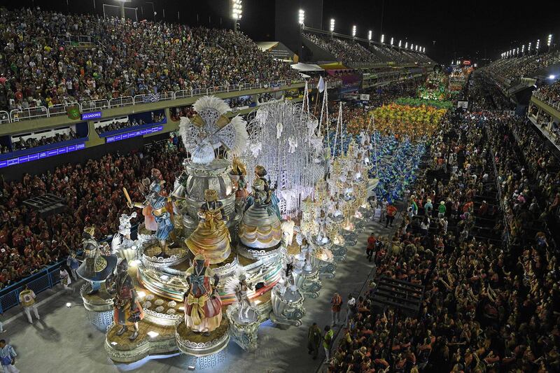 Members of the Grande Rio samba school parade with floats during the first night of Rio's carnival parade. AFP