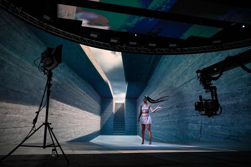 A model presents a creation by "Nicolas Lecourt Mansion" during the filming of a AW21 Women's Fall-Winter 2020-2021 Ready-to-Wear collection fashion show at Epinay-sur-Seine. AFP