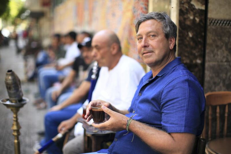 Chef John Torode drinking coffee in Cairo during the filming of his Middle East series. Photo: David Warren