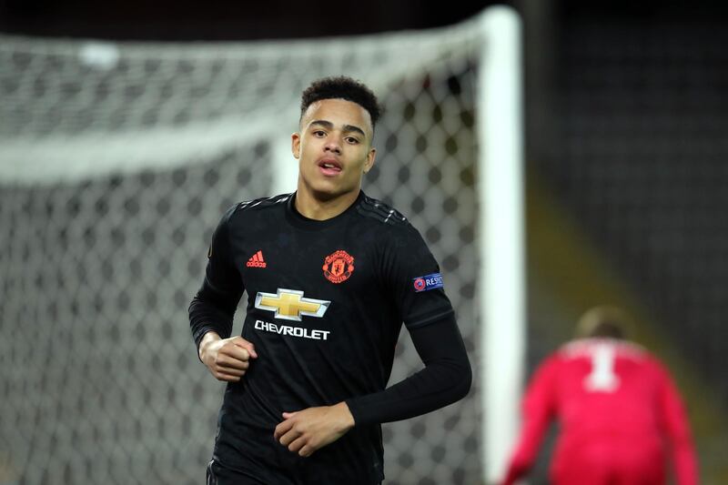 LINZ, AUSTRIA - MARCH 12: (FREE FOR EDITORIAL USE) In this handout image provided by UEFA, Mason Greenwood of Manchester United celebrates after scoring his team's fourth goal during the UEFA Europa League round of 16 first leg match between LASK and Manchester United at Linzer Stadion on March 12, 2020 in Linz, Austria. The match is played behind closed doors as a precaution against the spread of COVID-19 (Coronavirus).  (Photo by UEFA - Handout/UEFA via Getty Images )