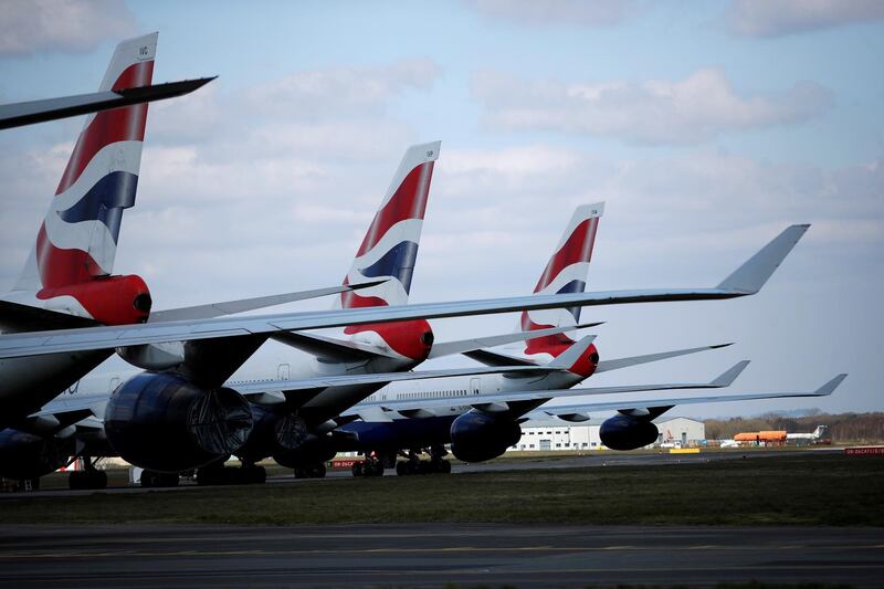 FILE PHOTO: British Airways planes are seen parked at Bournemouth Airport, as the spread of the coronavirus disease (COVID-19) continues, Bournemouth, Britain, April 1, 2020. REUTERS/Paul Childs -/File Photo