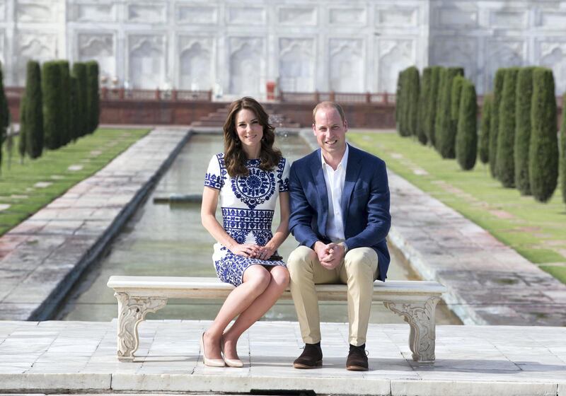 AGRA, INDIA - APRIL 16:  Prince William, Duke of Cambridge and Catherine, Duchess of Cambridge sit in front of the Taj Mahal during day seven of the royal tour of India and Bhutan on April 16, 2016 in Agra, India. This is the last engagement of the Royal couple after a week long visit to India and Bhutan that has taken them in cities such as Mumbai, Delhi, Kaziranga, Thimphu and Agra.  (Photo by  Ian Vogler - Pool/Getty Images)