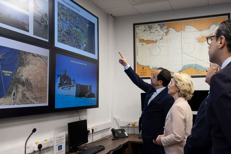 President of Cyprus Nikos Christodoulides, left, and President of the European Commission Ursula von der Leyen visiting the joint search and rescue co-ordination centre in Larnaca, Cyprus, on Friday.  AFP