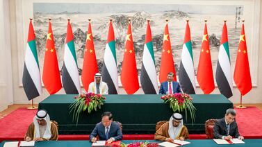 President Sheikh Mohamed and Chinese President Xi Jinping witness the signing of a Memorandum of Understanding, at the Great Hall of the People, in Beijing. Photo: UAE Presidential Court