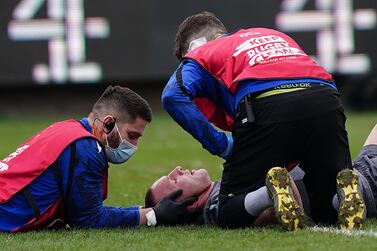 Bath's Sam Underhill receives treatment to a head injury during the Heineken Champions Cup, Pool A match at The Recreation Ground, Bath. Picture date: Saturday January 22, 2022.