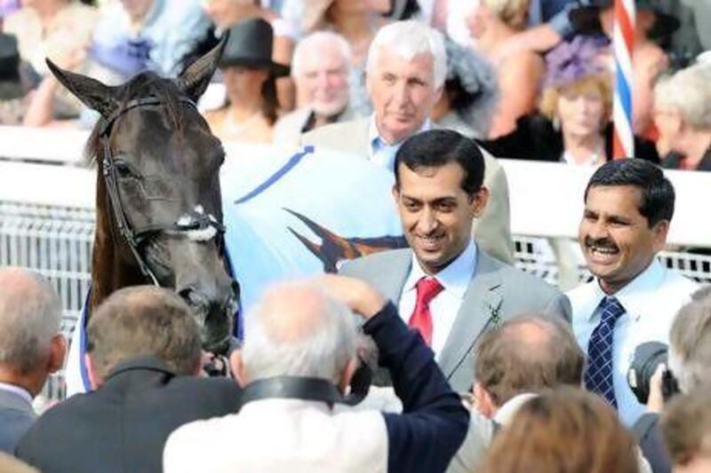 Zafar Abbas, right and below, may not be the focus of media attention but handler Mahmood Al Zarooni, centre, is appreciative of his role in the success of quality horses like Blue Bunting.