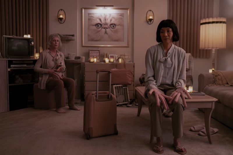 Jamie Lee Curtis, left, and Yeoh in a scene from Everything Everywhere All at Once. Photo: A24