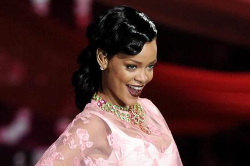 FILE - This Nov. 7, 2012 file photo shows singer Rihanna during the 2012 Victoria's Secret Fashion Show in New York. Rihanna has signed on to executive produce the new series "Styled to Rock" for the Style network. The 10-episode series set to air in 2013 will give 12 aspiring designers, chosen by Rihanna, an opportunity to style A-list stars. (Photo by Evan Agostini/Invision/AP, file)