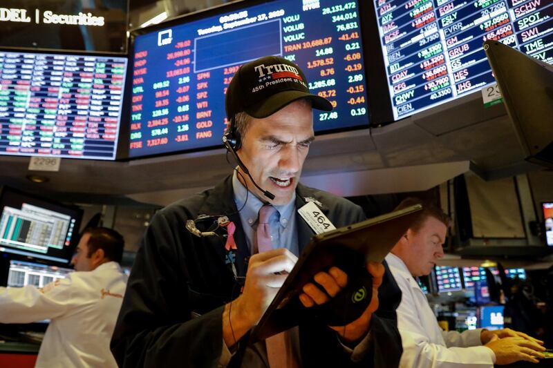 Traders work on the floor at the New York Stock Exchange (NYSE) in New York, U.S., September 17, 2019. REUTERS/Brendan McDermid