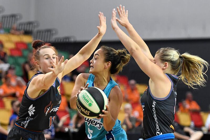 Southside Flyers Leilani Mitchell finds herself surrounded during the WNBL match against Townsville Fire at Townsville Stadium, on Thursday, November 19. Getty