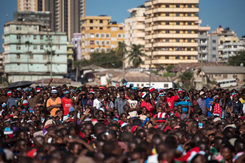 People attend a political rally in Dar es Salaam, Tanzania. More than half of the increase in global population up to 2050 will be concentrated in just eight countries — including Tanzania. AFP