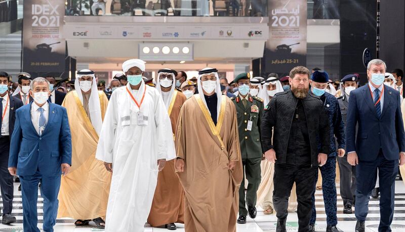 ABU DHABI, UNITED ARAB EMIRATES - February 21, 2021: HH Sheikh Mansour bin Zayed Al Nahyan, UAE Deputy Prime Minister and Minister of Presidential Affairs (front 3rd R), tours the 2021 International Defence Exhibition and Conference (IDEX), at Abu Dhabi National Exhibition Centre (ADNEC). Seen with HE Ramzan Kadyrov President of the Chechnya (front 2nd R).

( Hamad Al Kaabi / Ministry of Presidential Affairs )​
---