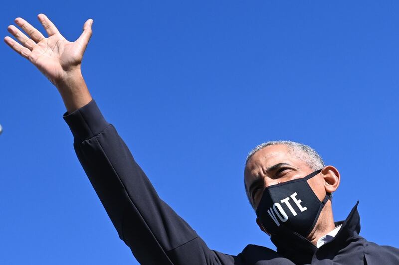 Former US President Barack Obama arrives to speak for Democratic presidential candidate Joe Biden at a campaign event in Flint, Michigan.  AFP