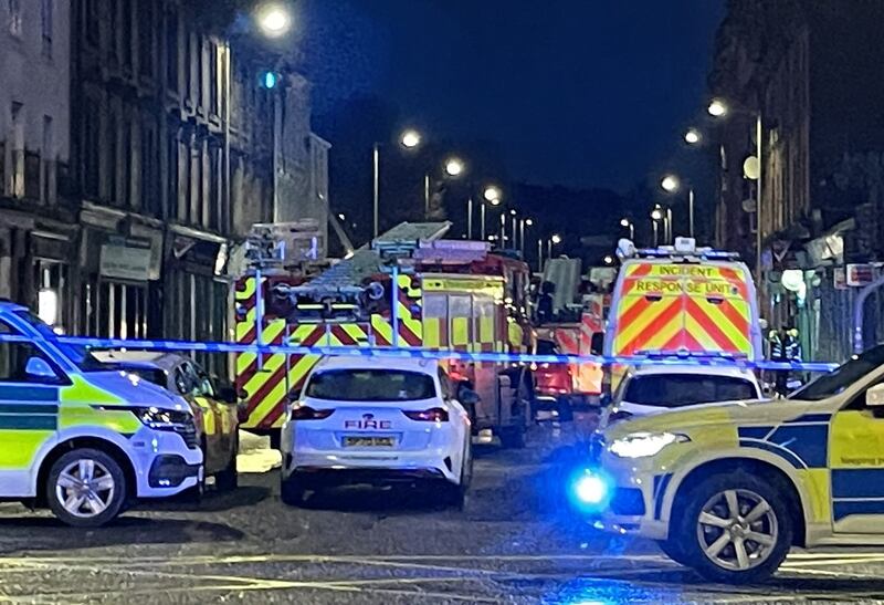 Emergency services at the scene after a fire at the New County Hotel in Perth. PA