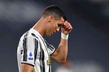 TURIN, ITALY - MAY 09: Cristiano Ronaldo of Juventus looks dejected during the Serie A match between Juventus and AC Milan at on May 09, 2021 in Turin, Italy. Sporting stadiums around Italy remain under strict restrictions due to the Coronavirus Pandemic as Government social distancing laws prohibit fans inside venues resulting in games being played behind closed doors. (Photo by Valerio Pennicino/Getty Images)