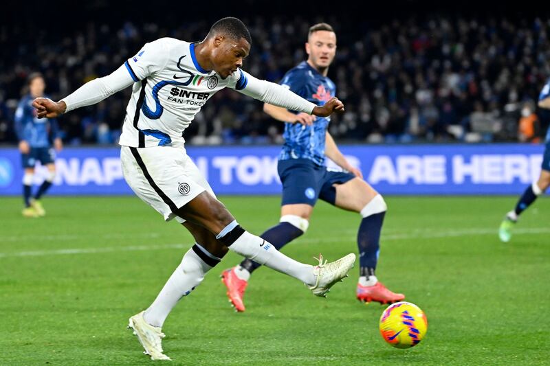 Inter Milan's Denzel Dumfries shoots at goal. AFP