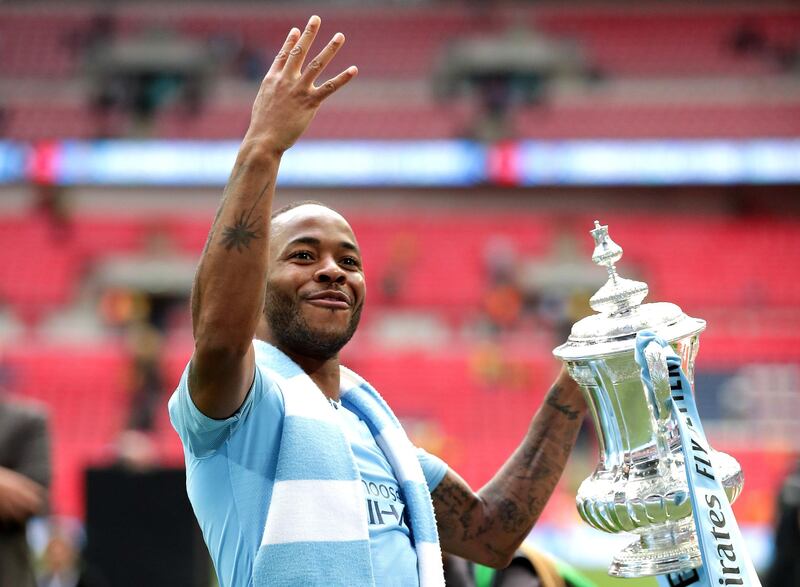 LONDON, ENGLAND - MAY 18:  Raheem Sterling of Manchester City celebrates following his team's victory in the the FA Cup Final match between Manchester City and Watford at Wembley Stadium on May 18, 2019 in London, England. (Photo by Richard Heathcote/Getty Images)