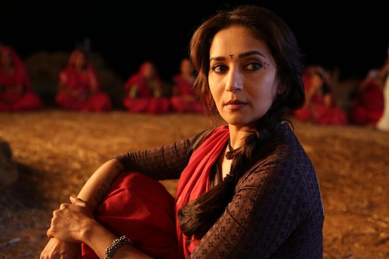 Madhuri Dixit plays the leader of the all-female Gulaab gang, based on the real-life Gulabi gang, in the film Gulaab Gang. Courtesy: B4U