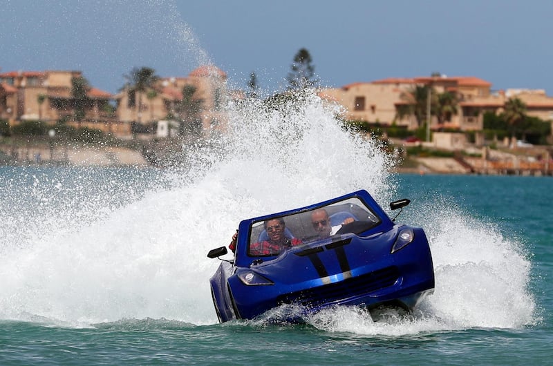 Karim Amin, 29, one of the three Egyptians who designed the water car puts it through its paces in Alexandria, Egypt. Reuters