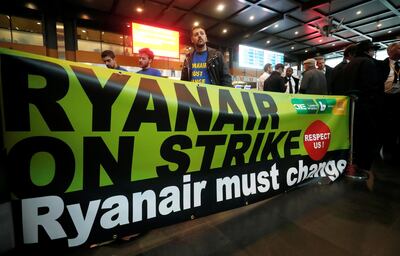FILE PHOTO: Belgian Ryanair pilots and crew members take part in a protest during a wider European strike at the airline to protest slow progress in negotiating a collective labour agreement, at Brussels South Charleroi Airport, Belgium September 28, 2018. REUTERS/Yves Herman/File Photo