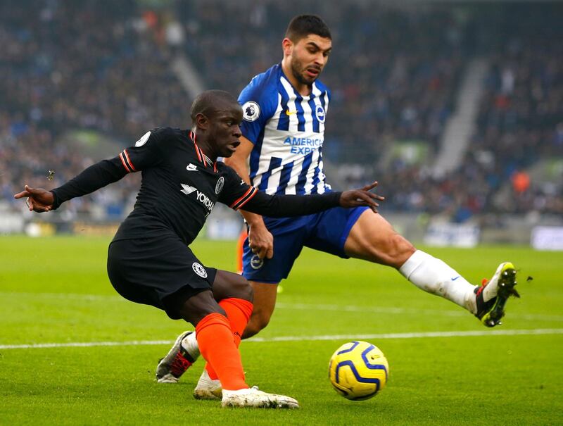 Chelsea's N'Golo Kante, left, vies for the ball with Brighton & Hove Albion's Neal Maupay. EPA