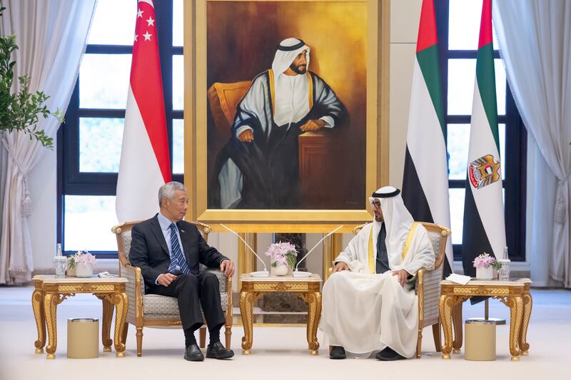 President Sheikh Mohamed and Mr Lee during an official reception. Hamad Al Kaabi / UAE Presidential Court
