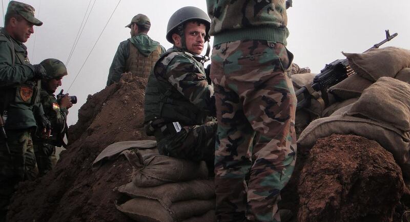 Kurdish Peshmerga fighters man a front line position in Ninevah province, northern Iraq as Kurdish fighters retaking territory from ISIL in this January 27, 2015 photo. AP Photo/Vivian Salama