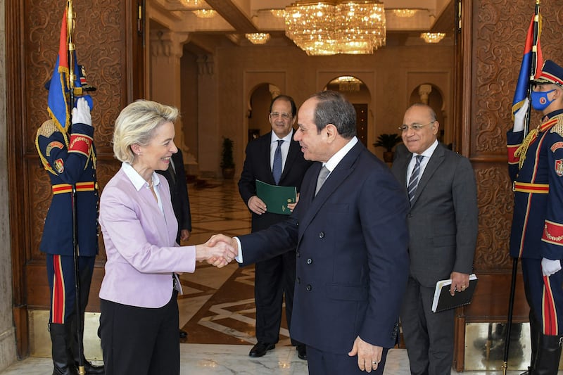 Egyptian President Abdel Fattah El Sisi greets the President of the European Commission, Ursula von der Leyen, to the presidential palace in Cairo. AFP