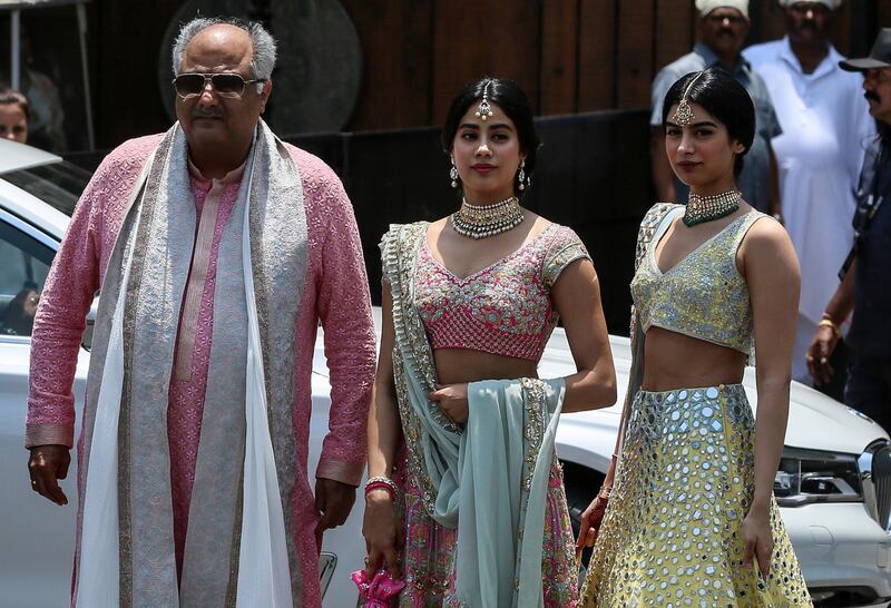 Director and producer Boney Kapoor (L) along with his daughters and actresses Janhvi Kapoor (C) and Khushi Kapoor (R) arrive at the wedding ceremony of his sister and Bollywood actress Sonam Kapoor in Mumbai, India, 08 May 2018. The 32-year-old actress got married to Indian  businessman Anand Ahuja in a sikh wedding at her aunt's mansion Rockdale.  EPA/DIVYAKANT SOLANKI