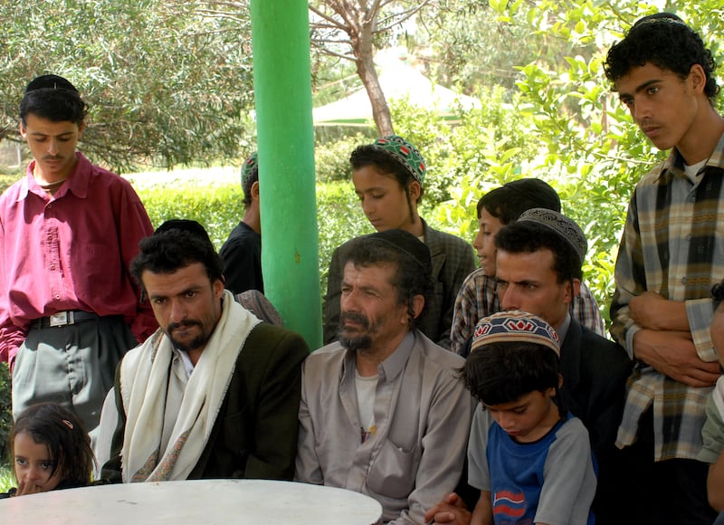 Salem Mussa Marhabi, centre, with male family members.