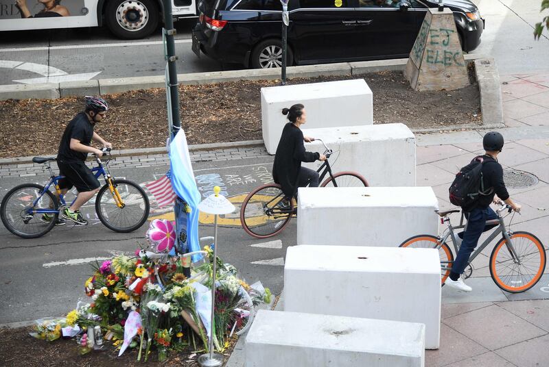 Bicyclists ride past cement barricades, which were placed along the West Side Highway bike path on November 3, 2017 in New York City.
Sayfullo Saipov, 29, an immigrant from Uzbekistan, is charged with terrorism offences after allegedly driving a rented pickup truck down a mile-long stretch of bike path in Manhattan. / AFP PHOTO / ANGELA WEISS