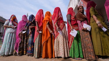 A file picture of women waiting to cast their votes in Chachiyawas village, near Ajmer, India. AP