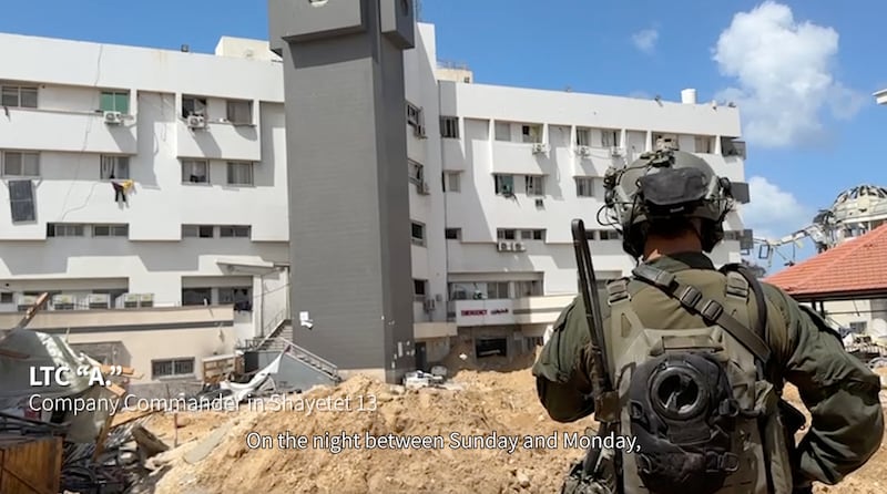 A screengrab from a video released by the Israeli military on March 25 shows an Israeli soldier outside Al Shifa Hospital, in Gaza city. Reuters