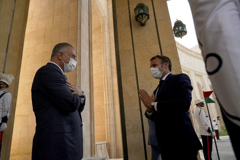 Iraqi Prime Minister Mustafa Al Kadhimi meets with French President Emmanuel Macron in Baghdad, Iraq.  Reuters