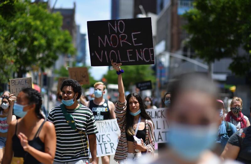 Protesters march during a "Black Trans Lives Matter" march against police brutality in the Brooklyn borough of New York City. AFP