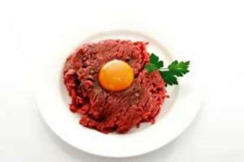 Mandatory Credit: Photo by WestEnd61 / Rex Features ( 769134A )

Beef Tatare with egg on plate, elevated view

VARIOUS STOCK




