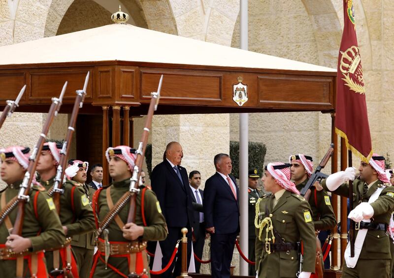 King Abdullah II and King Harald ) look on during the welcome ceremony  in Amman, Jordan.  EPA