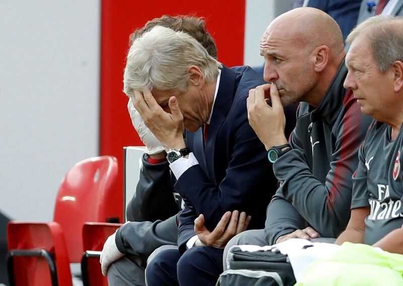 Football Soccer - Premier League - Liverpool vs Arsenal - Liverpool, Britain - August 27, 2017   Arsenal manager Arsene Wenger looks dejected    Action Images via Reuters/Carl Recine     EDITORIAL USE ONLY. No use with unauthorized audio, video, data, fixture lists, club/league logos or "live" services. Online in-match use limited to 45 images, no video emulation. No use in betting, games or single club/league/player publications. Please contact your account representative for further details.     TPX IMAGES OF THE DAY