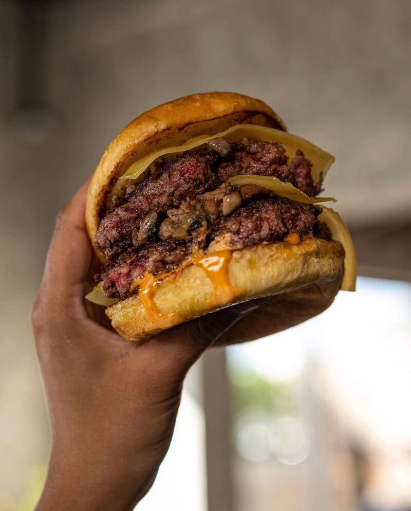 Wagyu burger, with melted Gouda, mushrooms and Sriracha sauce.