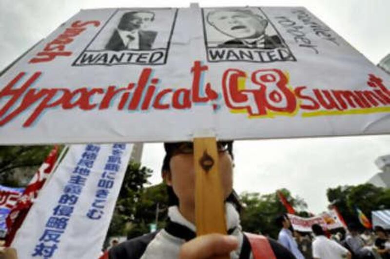 Anti-G8 activists take part in a demonstration in Sapporo ahead of the Hokkaido Toyako G8 Summit. Leaders of the eight major powers are reportedly set to agree on a new system of "food reserves" to assist hungry nations.