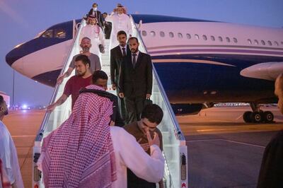 Prisoners of war arriving from Russia at the airport in Riyadh in September. Saudi Press Agency / AFP