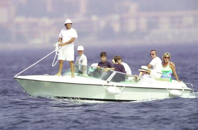 Dodi Fayed, Prince Harry and Princess Diana in St Tropez in 1997.  Wireimage