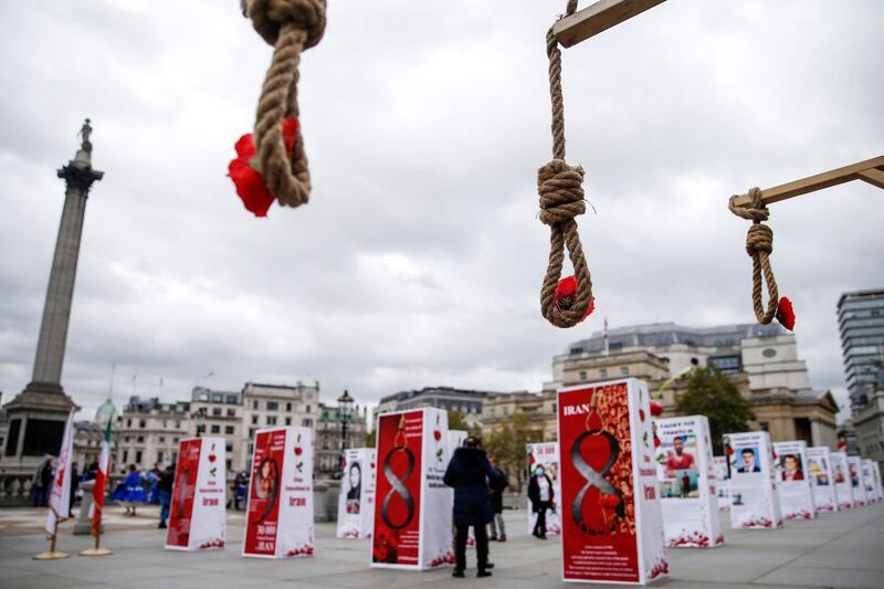 LONDON, ENGLAND - OCTOBER 10: An exhibition calling for an end to executions in Iran on Trafalgar Square on October 10, 2020 in London, England. The exhibition, held by Anglo-Iranian communities in the UK, marked the World Day against the Death Penalty. (Photo by Hollie Adams/Getty Images)