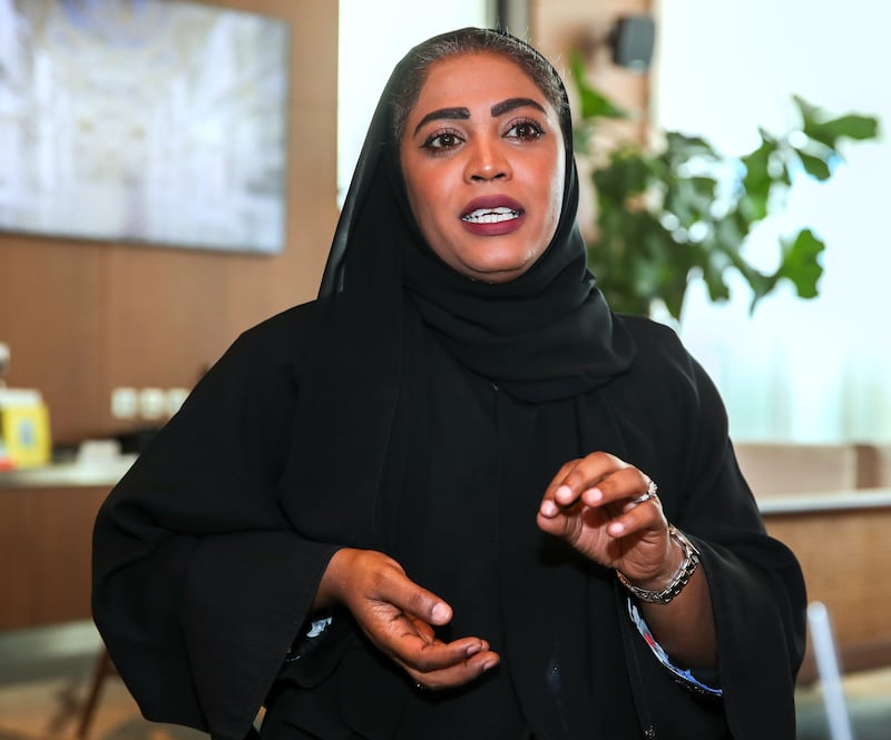 Badreya Al Ali works in a shop in Sharjah and earns about Dh12,500 per month. She says she loves her job despite the disrespectful customers she has to deal with. Victor Besa / The National