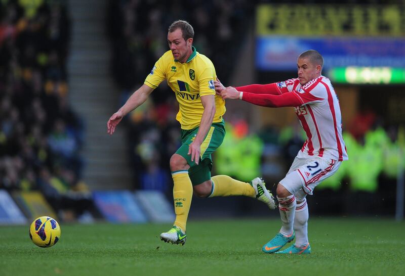 NORWICH, ENGLAND - NOVEMBER 03:  Michael Knightly of Stoke City battles with Steven Whittaker of Norwich City during the Barclays Premier League match between Norwich City and Stoke at Carrow Road on November 3, 2012 in Norwich, England.  (Photo by Jamie McDonald/Getty Images) *** Local Caption ***  155345846.jpg