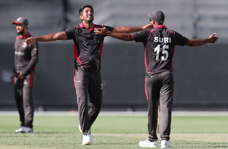 UAE's Junaid Siddique after taking the wicket of Nepal's Sompal Kami during the World Cup League 2 match at the Dubai International Stadium on Monday, March 21, 2022. All images Chris Whiteoak / The National